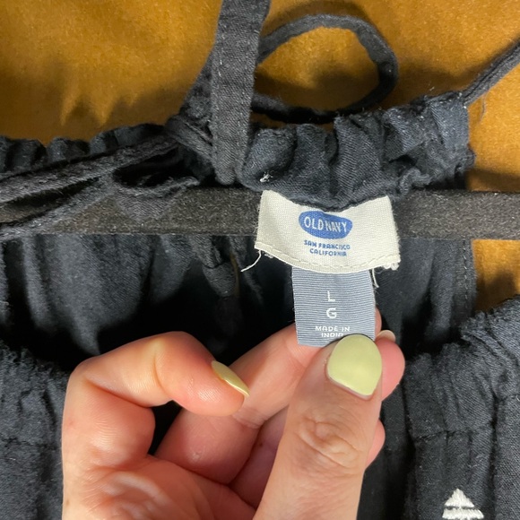 Black Sleeveless Romper with Embroidered Accents - Picture 2 of 4